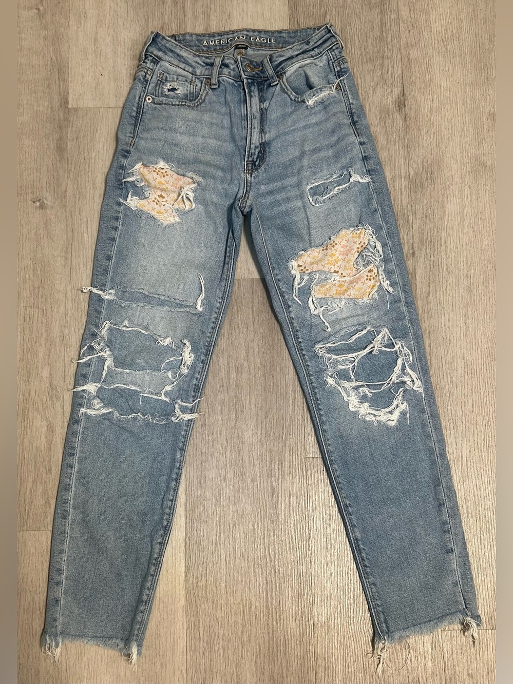 American Eagle Outfitters Light Blue Ripped Mom Jeans with Floral Patches